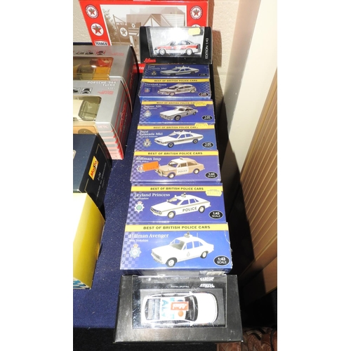 99 - Seven Best of British Police Cars, boxed models; also two further Schuco police car models (9)