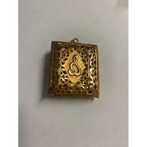 382 - Eastern yellow metal filigree locket pendant, weight approx. 14.8g, 4cm x 3.5cm