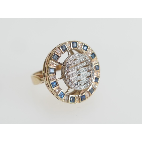 10 - Unusual diamond and sapphire cluster ring, set with rose cut diamonds in a circular grid encircled w... 