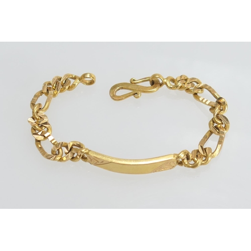 102 - Yellow metal identity bracelet, testing as 22ct, length 18cm, weight approx. 34g