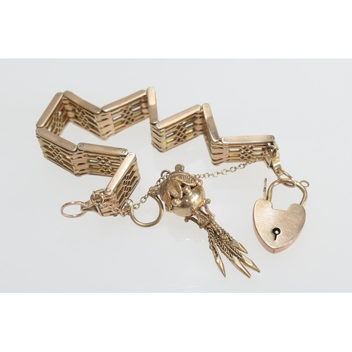 13 - 9ct gold gate link bracelet with ball tassel fob and padlock clasp, with safety chain, length 17cm, ... 