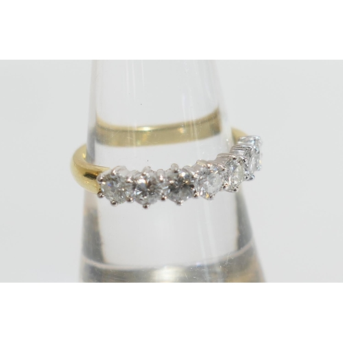 30 - Diamond seven stone ring, well matched brilliant cut stones estimated as K/L colour and SI clarity, ... 