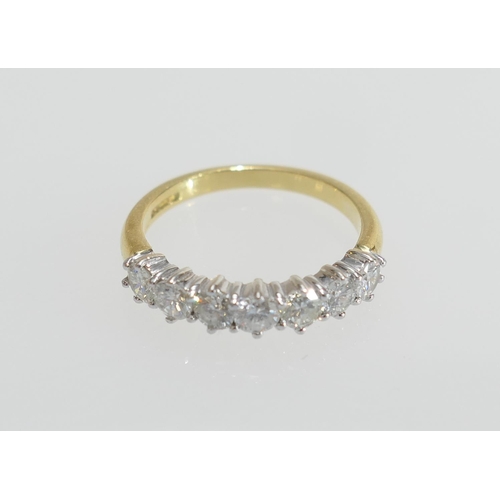 30 - Diamond seven stone ring, well matched brilliant cut stones estimated as K/L colour and SI clarity, ... 