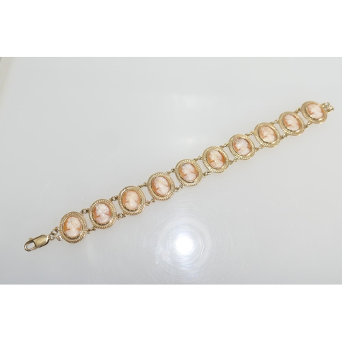 43 - 9ct gold cameo bracelet, set with ten oval cameos, each 11mm and carved with the profile of a lady, ... 