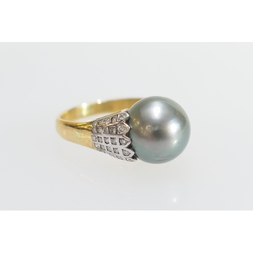 44 - Tahitian pearl and diamond dress ring, the pearl of approx. 11mm diameter, shouldered with tiny roun... 