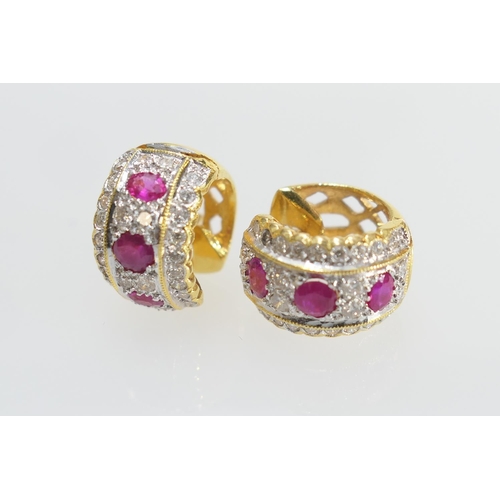 66 - Pair of ruby and diamond pave set cluster hoop earrings, in unmarked yellow metal testing as 18ct, 1... 