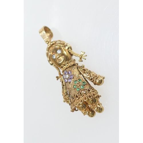 96 - 9ct gold gem set pigtailed girl pendant, fully articulated, marked 'Dan', height 60mm, width 27mm, g... 