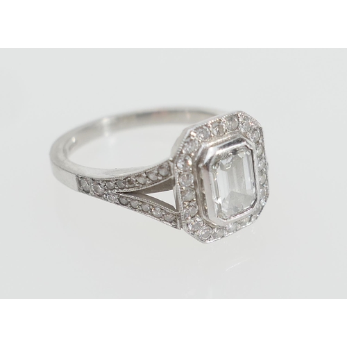 125 - Diamond solitaire ring, the GIA certificated emerald cut diamond weighing 0.71ct, colour H, clarity ... 