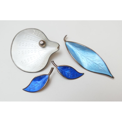 143 - David Andersen (Norway), aquamarine blue enamelled sterling silver leaf brooch, 6.5cm; also a pair o... 