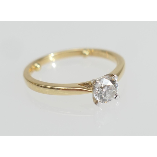 145 - Diamond solitaire ring, brilliant cut stone of approx. 0.5ct, in a platinum four claw mount, on an 1... 