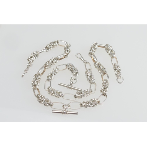 163 - Sterling silver suite comprising heavy fancy knot and open link albert style necklace, with T-bar an... 