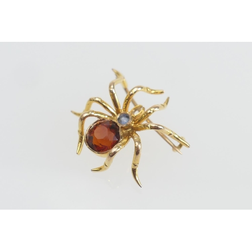 167 - Yellow gold and gem set spider brooch, set with two coloured gems (untested) in unmarked yellow gold... 