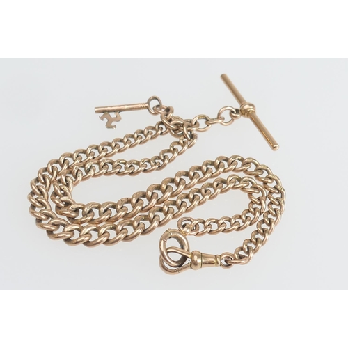 181 - 9ct gold double graduating curb link watch albert, centred with a T-bar and with a spring clip and a... 