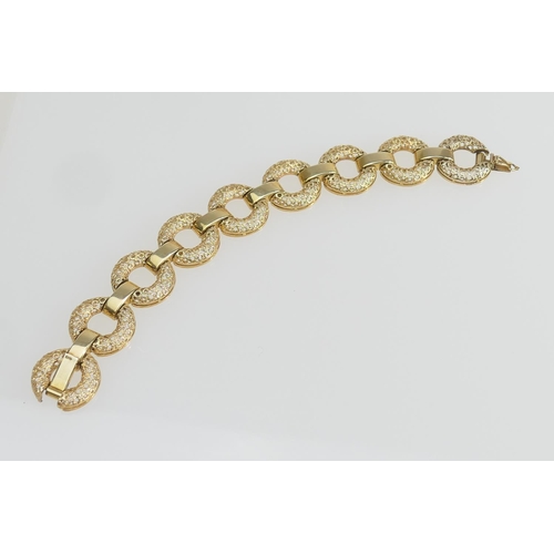 182 - 9ct gold textured ring link bracelet, 18.5cm, the links 20mm diameter, gross weight approx. 28.6g