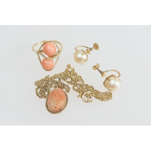 185 - 14ct gold coral bead dress ring, size L, gross weight approx. 3.8g; also a coral sunflower carved pe... 