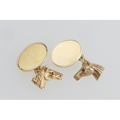 193 - Pair of 9ct gold equestrian chain cufflinks, worked with a horse head and plain oval, 17mm, gross we... 