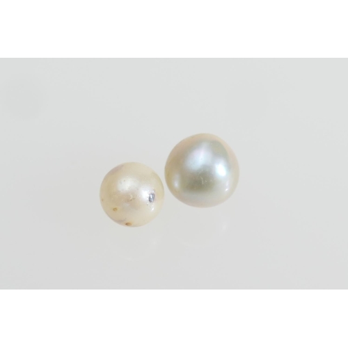 194 - Two saltwater pearls, approx. 8mm and 6mm diameter