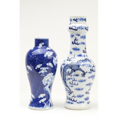 342 - Chinese blue and white bottle vase, late 19th Century, decorated with scrolling dragons amidst cloud... 