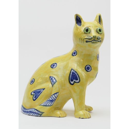 366 - Mosanic Galle style faience seated cat, circa 1900, with original glass eyes and decorated with blue... 