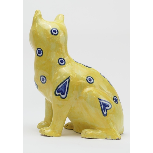 366 - Mosanic Galle style faience seated cat, circa 1900, with original glass eyes and decorated with blue... 