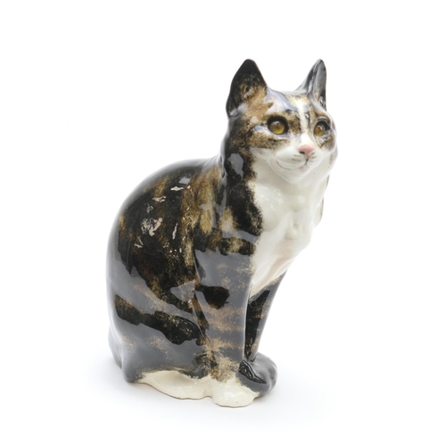 367 - Winstanley, Kensington Pottery tabby cat, with glass eyes and decorated in typical colours, signed, ... 