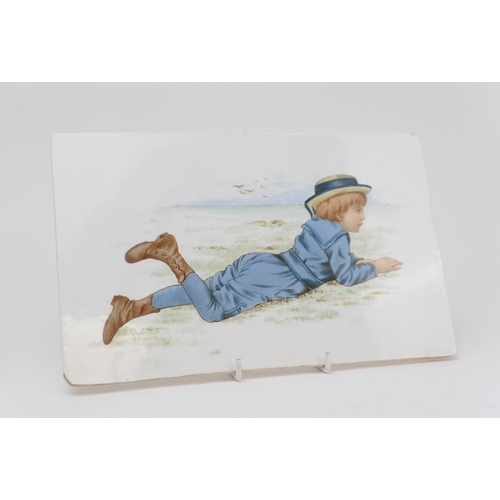 421 - W P & G Phillips Art Pottery studio plaque, decorated with a boy lying on the grass, signed with a m... 