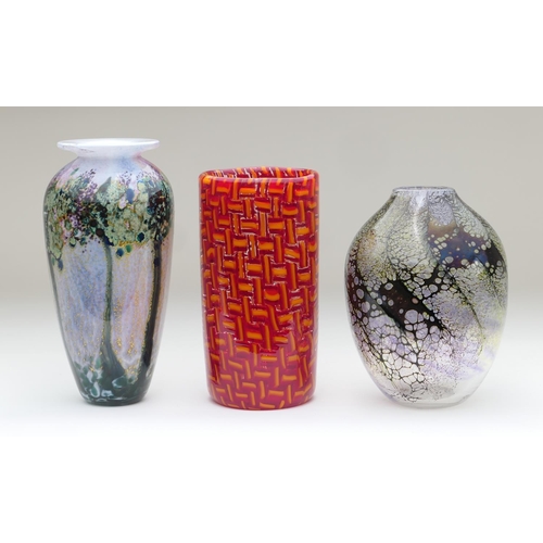 435 - Three art glass vases comprising: an Isle of Wight Studio Azurene Black vase, attributed to Michael ... 