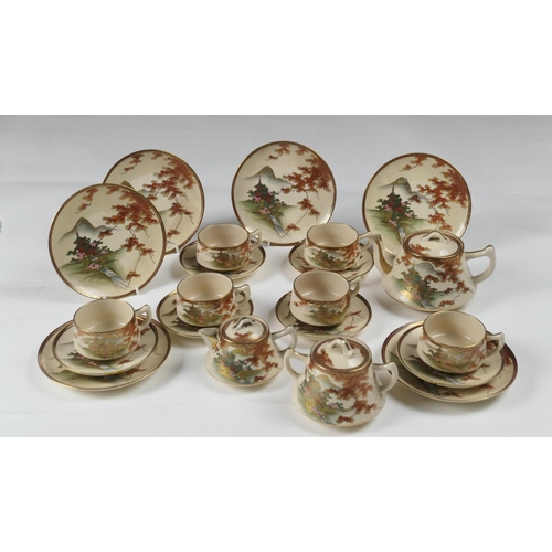 482 - Japanese Satsuma tea service, Taisho (1912-26), decorated with pavilions within a mountainous landsc... 