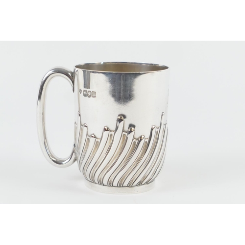 490 - Silver tankard, London 1907, half wrythen worked and engraved with a monogram, height 9.5cm, weight ... 