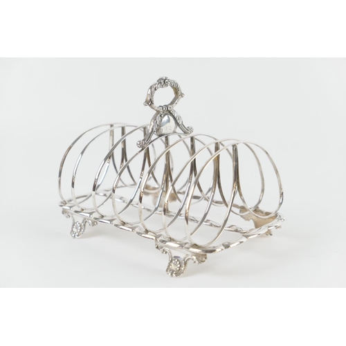 491 - William IV silver toast rack, maker RP GB, London 1835, six divisions raised on anthemion feet, 17cm... 