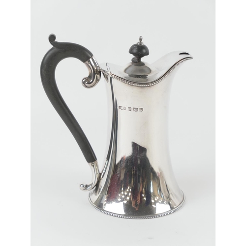 537 - George V silver hot water jug, maker JG Ltd, Birmingham 1920, lidded plain trumpet form with ebony f... 