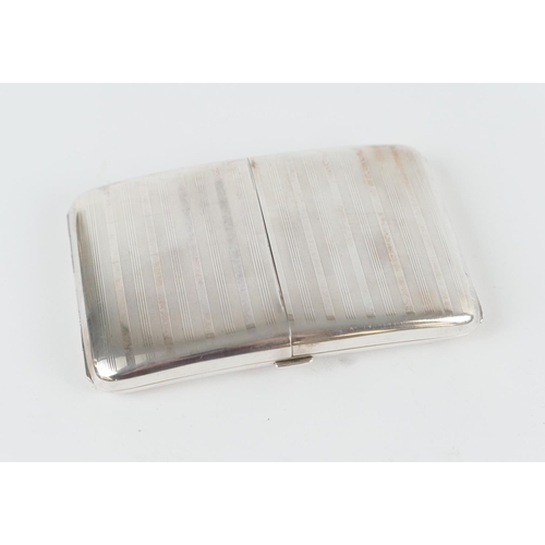 541 - George V silver double opening cigarette case, Birmingham 1924, slightly curved form with vertilinea... 