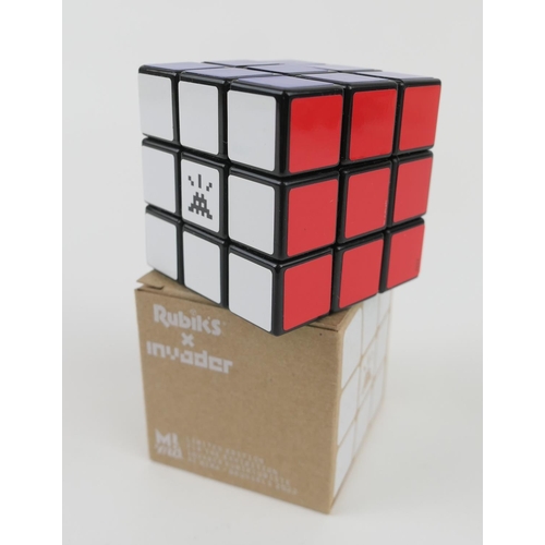 771 - Invader (British), Rubik's x Invader Cube, 2022, limited edition of 5000, in silkscreened box.
Relea... 