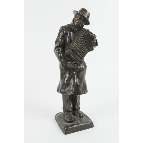 796 - Albert Pommier (1880-1943), The accordion player, bronze, signed, height 28cm