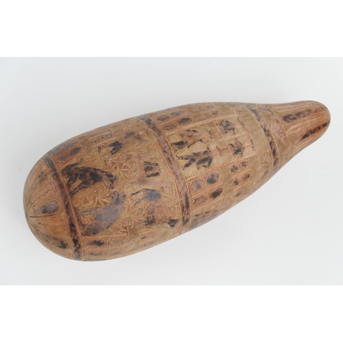 817 - Dutch Colonial carved gourd, possibly late 19th Century, decorated throughout with figures dancing, ... 