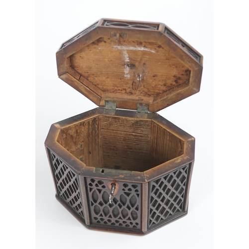 823 - George III mahogany blind fretwork tea caddy, of octagonal form, width 16cm, height 13cm