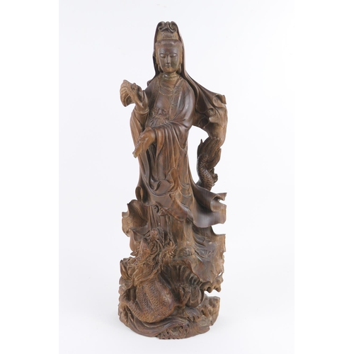 824 - Chinese carved hardwood figure of Guanyin, early to mid 20th Century, height 59cm