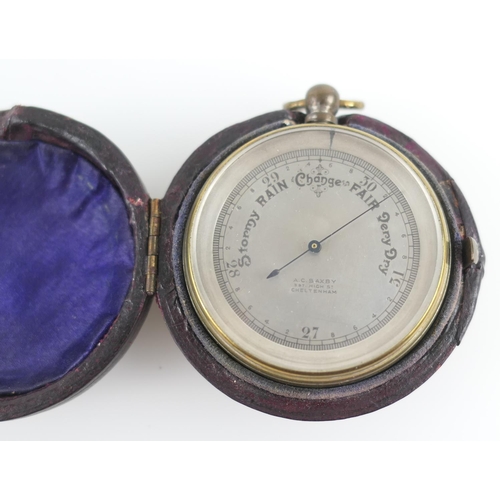 881 - Edwardian brass cased pocket aneroid barometer, retailed by A C Saxby, Cheltenham, silvered dial, th... 