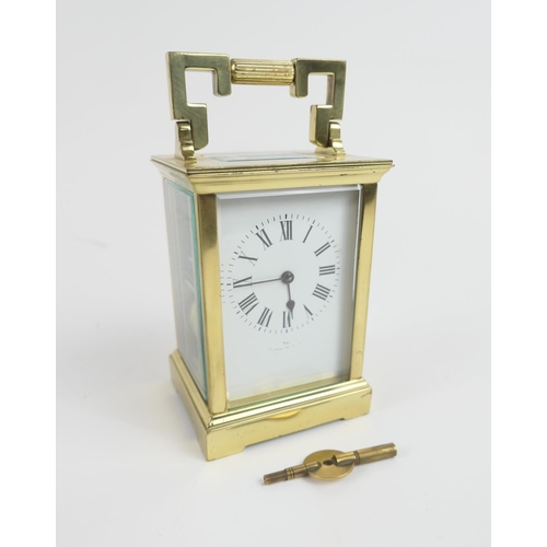 886 - French brass carriage clock, chiming on the hours and half hours, the dial indistinctly inscribed wi... 