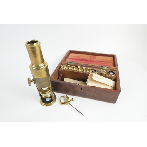 903 - Martins brass compound microscope, with lenses and attachments, within original mahogany case, 27.5c... 