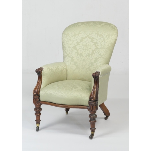 916 - Victorian mahogany and green silk damask upholstered armchair, circa 1860, carved forearms, carved a... 