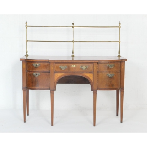 919 - George III mahogany and inlaid breakfront sideboard, circa 1820, having a brass rail back, boxwood l... 