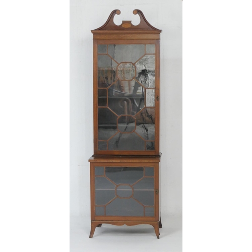 920 - Edwardian mahogany and inlaid double display cabinet in the Sheraton Revival style, having a swan ne... 