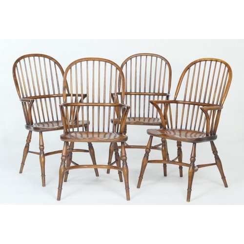 922 - Set of four ash and elm high back Windsor chairs, third quarter 20th Century, each with hooped back ... 