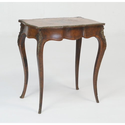 923 - Victorian walnut table in the French style by Howard & Sons, circa 1880, the shaped rectangular top ... 