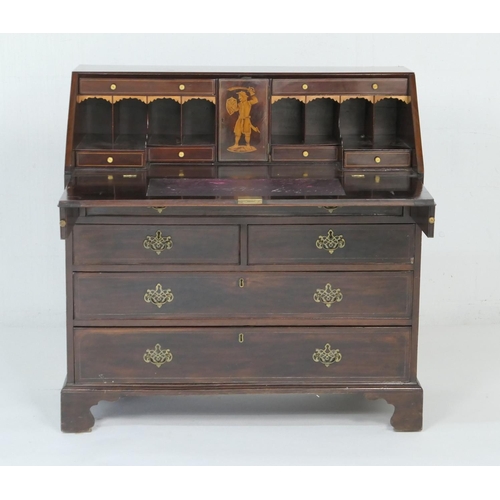 924 - George III mahogany and inlaid bureau, circa 1790, the slope front inlaid with a classical urn in bo... 