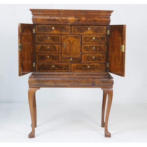 960 - Queen Anne style walnut cabinet on stand, having a moulded cornice with barrel fronted frieze drawer... 