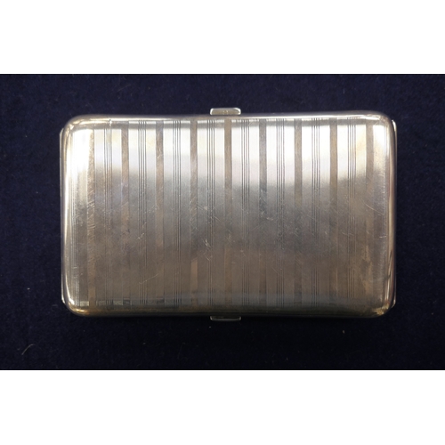 541 - George V silver double opening cigarette case, Birmingham 1924, slightly curved form with vertilinea... 