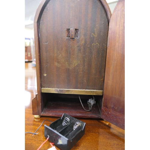 889 - Eureka Clock Company mahogany cased electric mantel clock, 1906, the lancet shaped case with boxwood... 