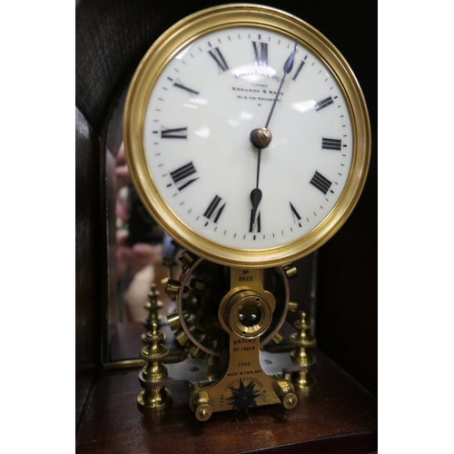 889 - Eureka Clock Company mahogany cased electric mantel clock, 1906, the lancet shaped case with boxwood... 